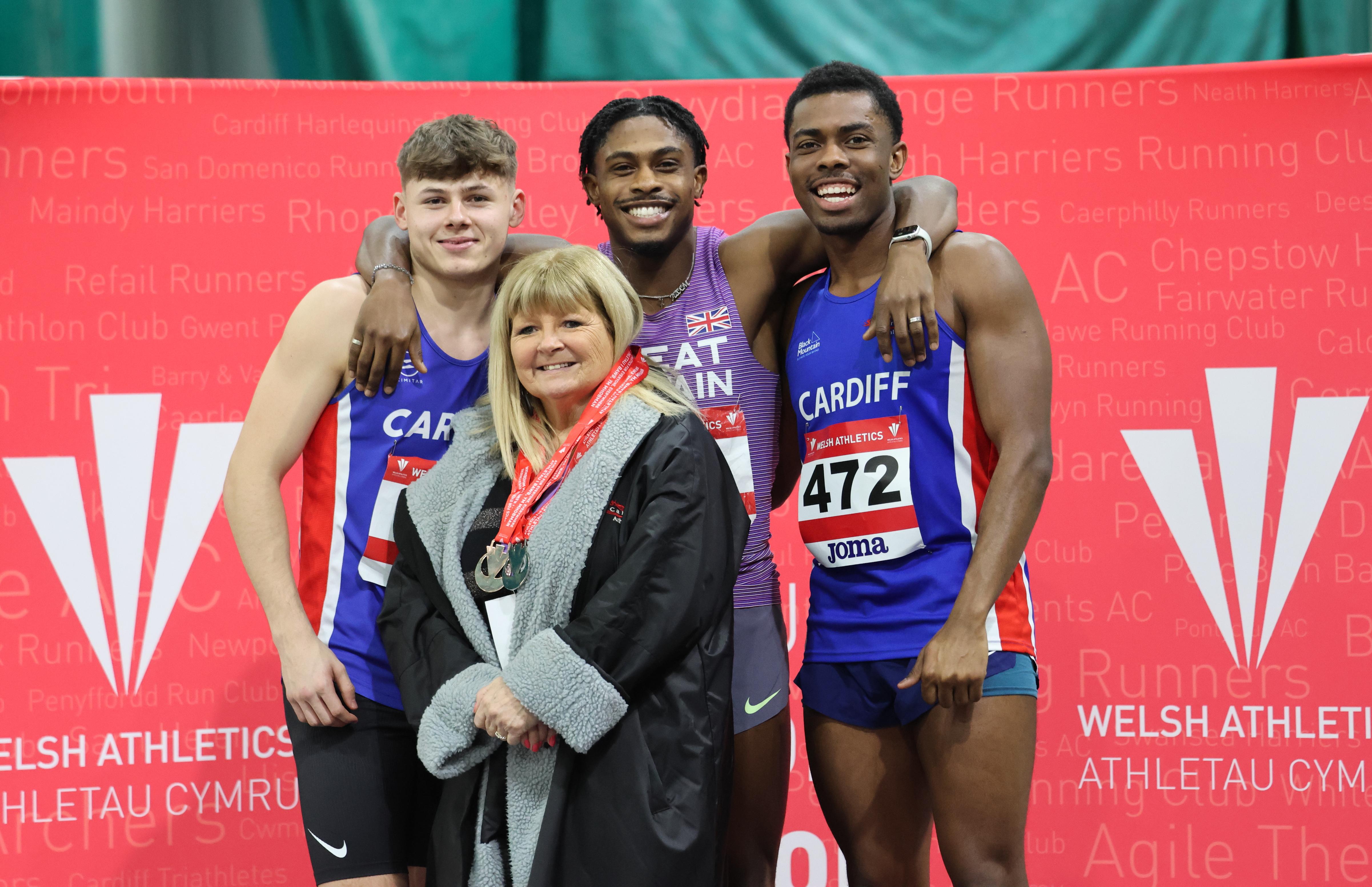 Jeremiah Azu, Lewis Stephens and Alex Azu with coach Helen James.
